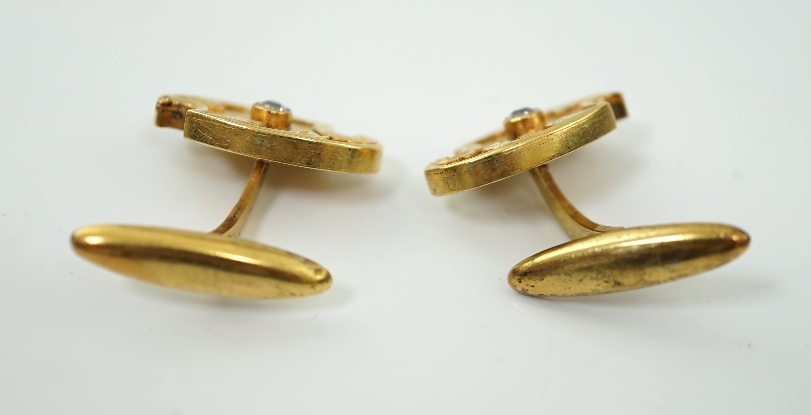 A pair of Russian 56 zolotnik gold and solitaire diamond set cufflinks
